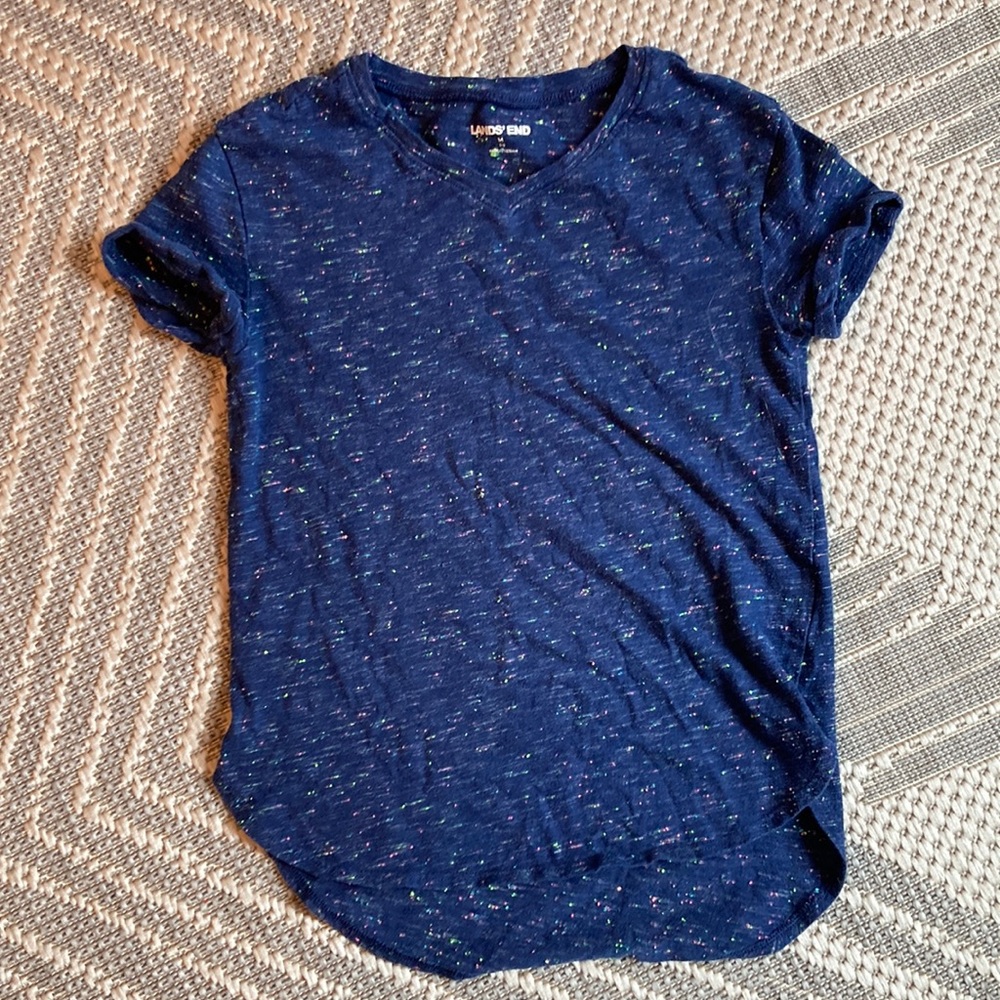 Blue v neck shirt with multi colored speckles and rolled cuffs